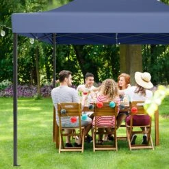 LifeGoods Partytent - 3x4.5 M - Zijwanden - Easy Up - Opvouwbaar - Waterdicht - Draagtas Met Wieltjes - Donkerblauw 18 LifeGoods Partytent - 3x4.5 M - Zijwanden - Easy Up - Opvouwbaar - Waterdicht - Draagtas Met Wieltjes - Donkerblauw -Fijne Tuinmeubelwinkel 1200x1200 938